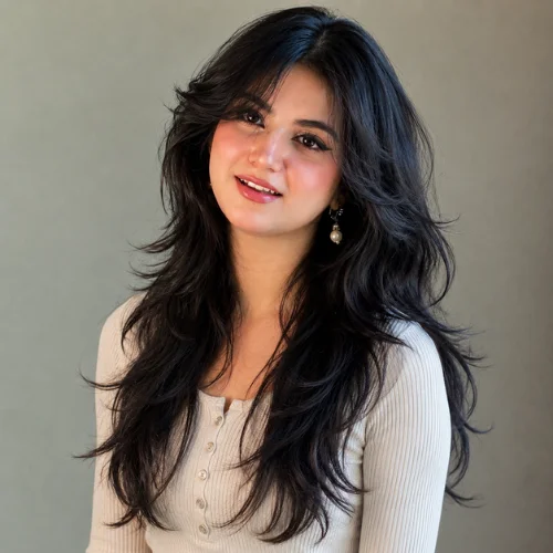 Layered wolf cut for thick long hair with feathered ends and soft curtain bangs