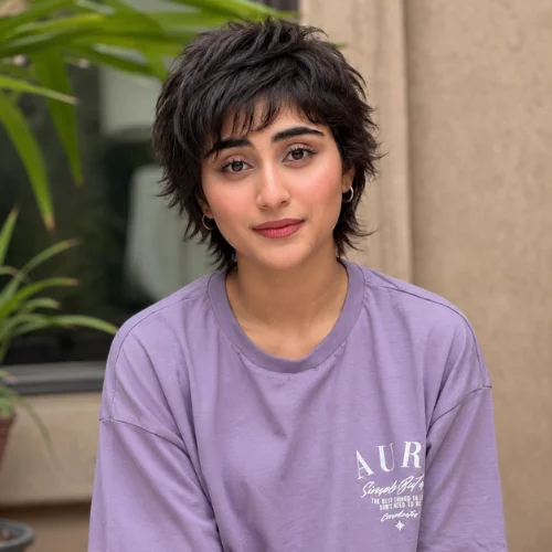 Pixie wolf cut with choppy textured layers and soft fringe for women, trendy short haircut inspiration .